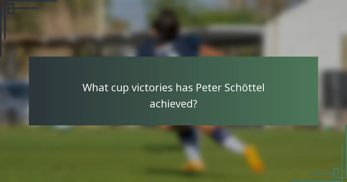 What cup victories has Peter Schöttel achieved?