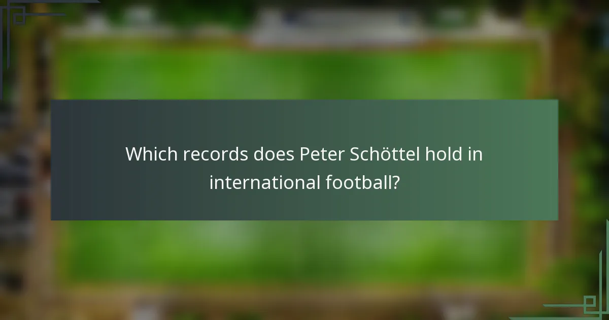 Which records does Peter Schöttel hold in international football?